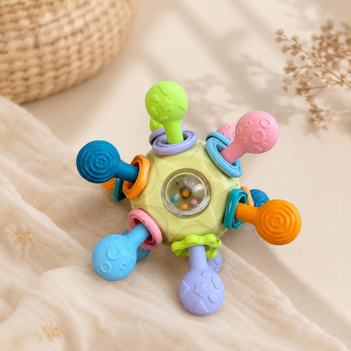 Atomic spinning teether ball